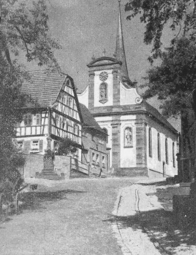 Alte romanische Wehrkirche Fuchsstadt. Turm 12. Jahrhundert, Langhaus 1766 von Joh. Mich. Fischer. Bedeutende Innenausstattung durch Materno Bossi und Joh. Pet. Herrlein 1766.